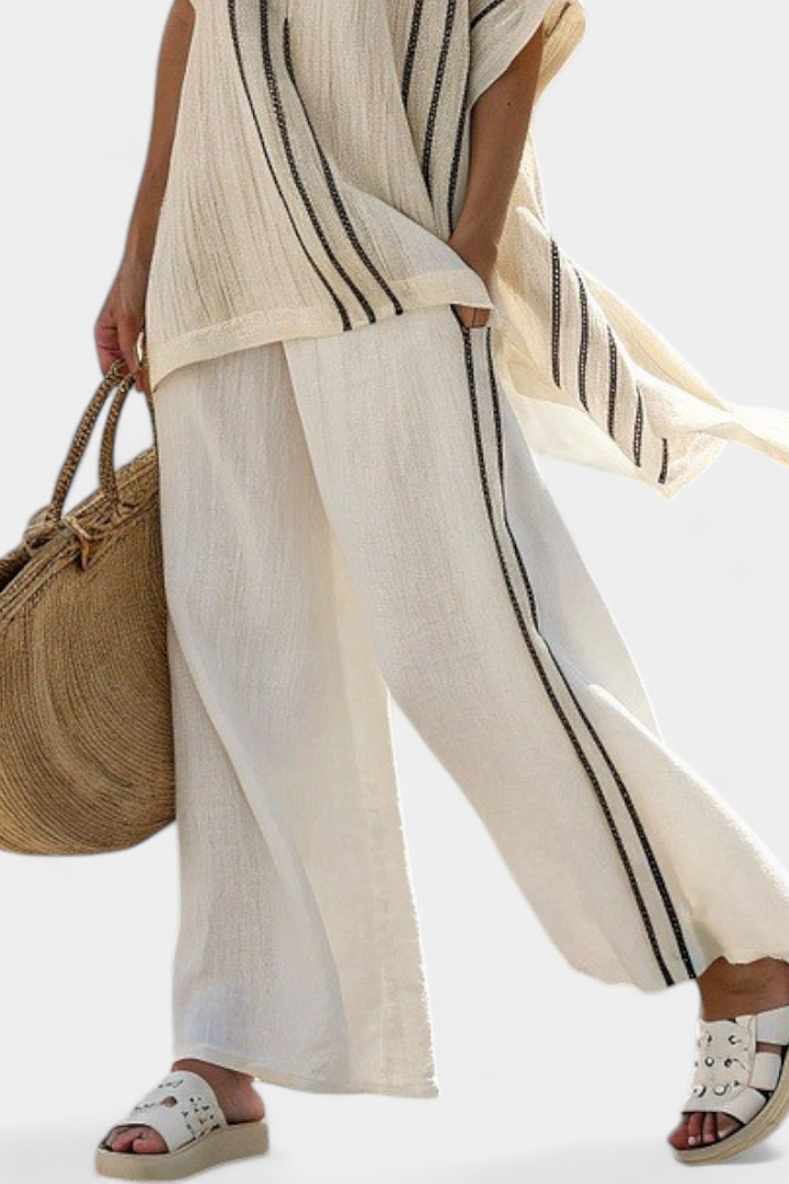 Raffaella – elegant ivory linen blouse and black striped pants